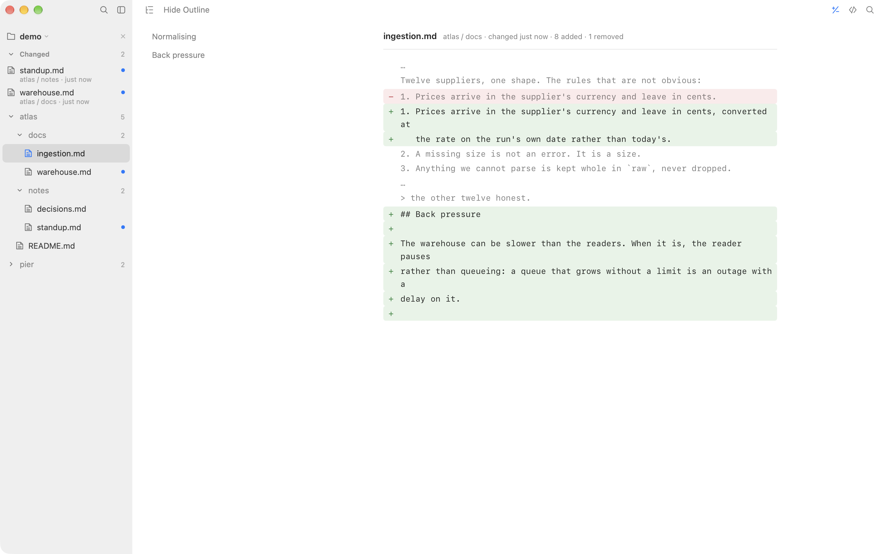 A line by line diff of a document, with an outline column beside it naming the two sections the changes are in.